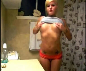 Lovely blond Girlfriend showing knockers in douche