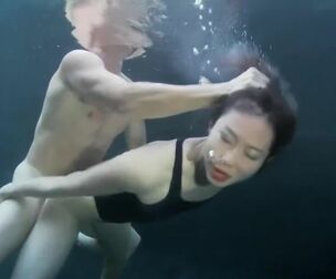 bikini chick intercourse with a dude underwater