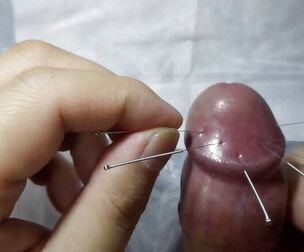 Cock and ball torture needling lollipop